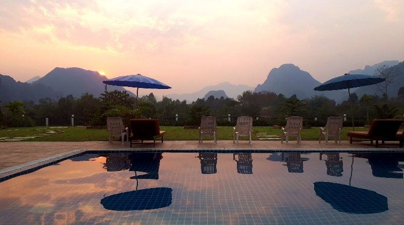 sunset vang vieng simon riverside hotel laos