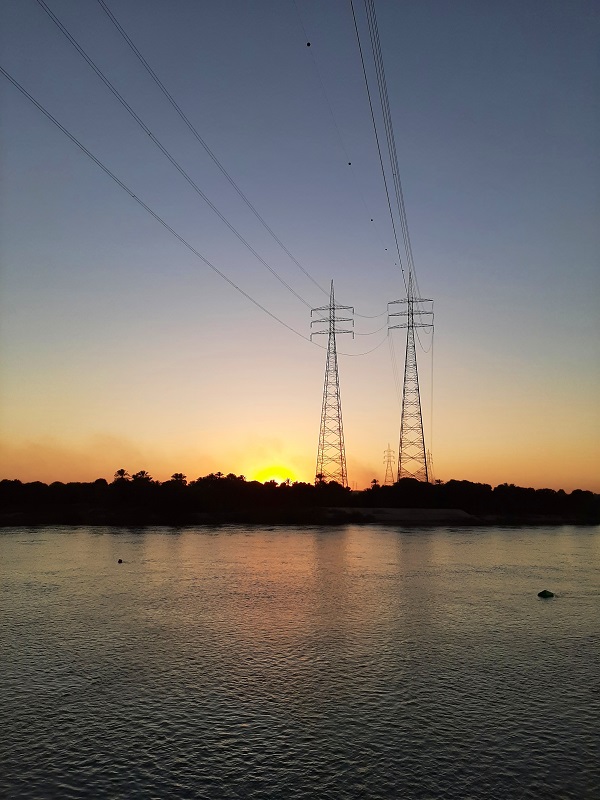 sunset electricity poles