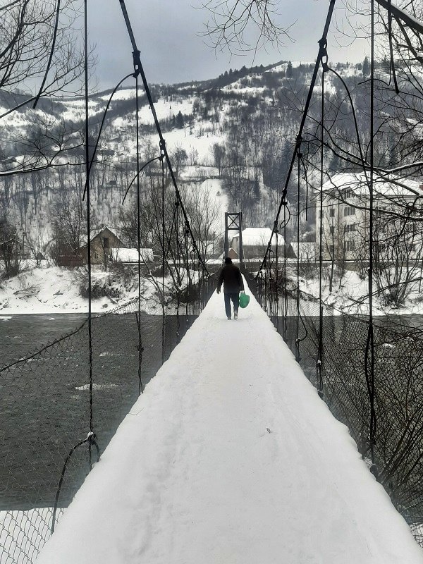 pedestrian suspension bridge river tisza