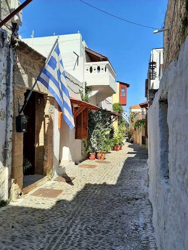 greece greek flags old town street rhodes