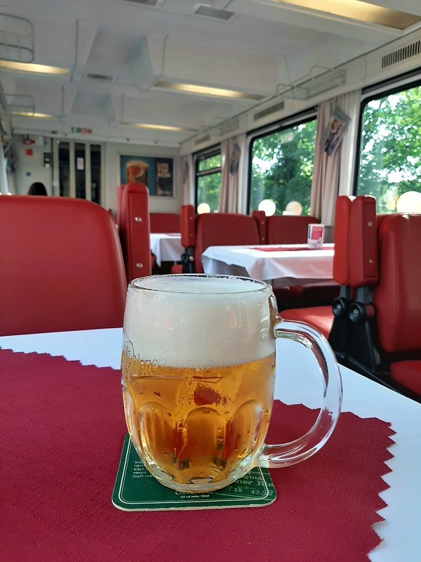 draught pilsner urquell czech dining car berliner eurocity train hamburg berlin prague