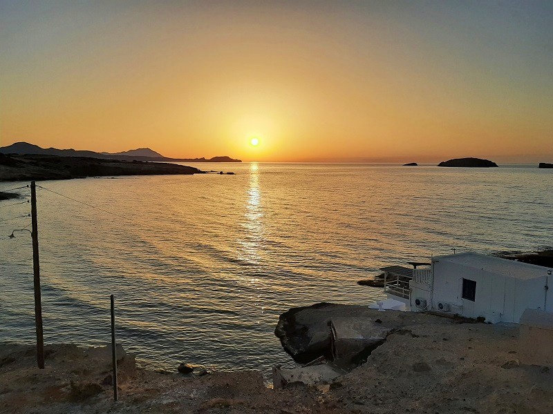 milos sunset cyclades trip