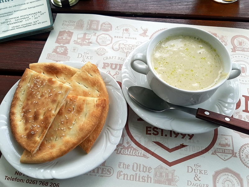 Garlic cream soup with homemade salty pita bread