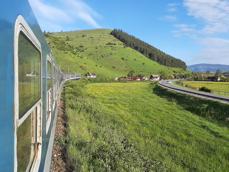 open window train travel railway line transylvania