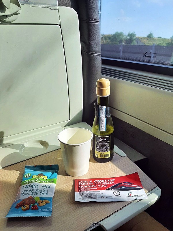 prosecco nuts business class frecciarossa high-speed train milan bologna